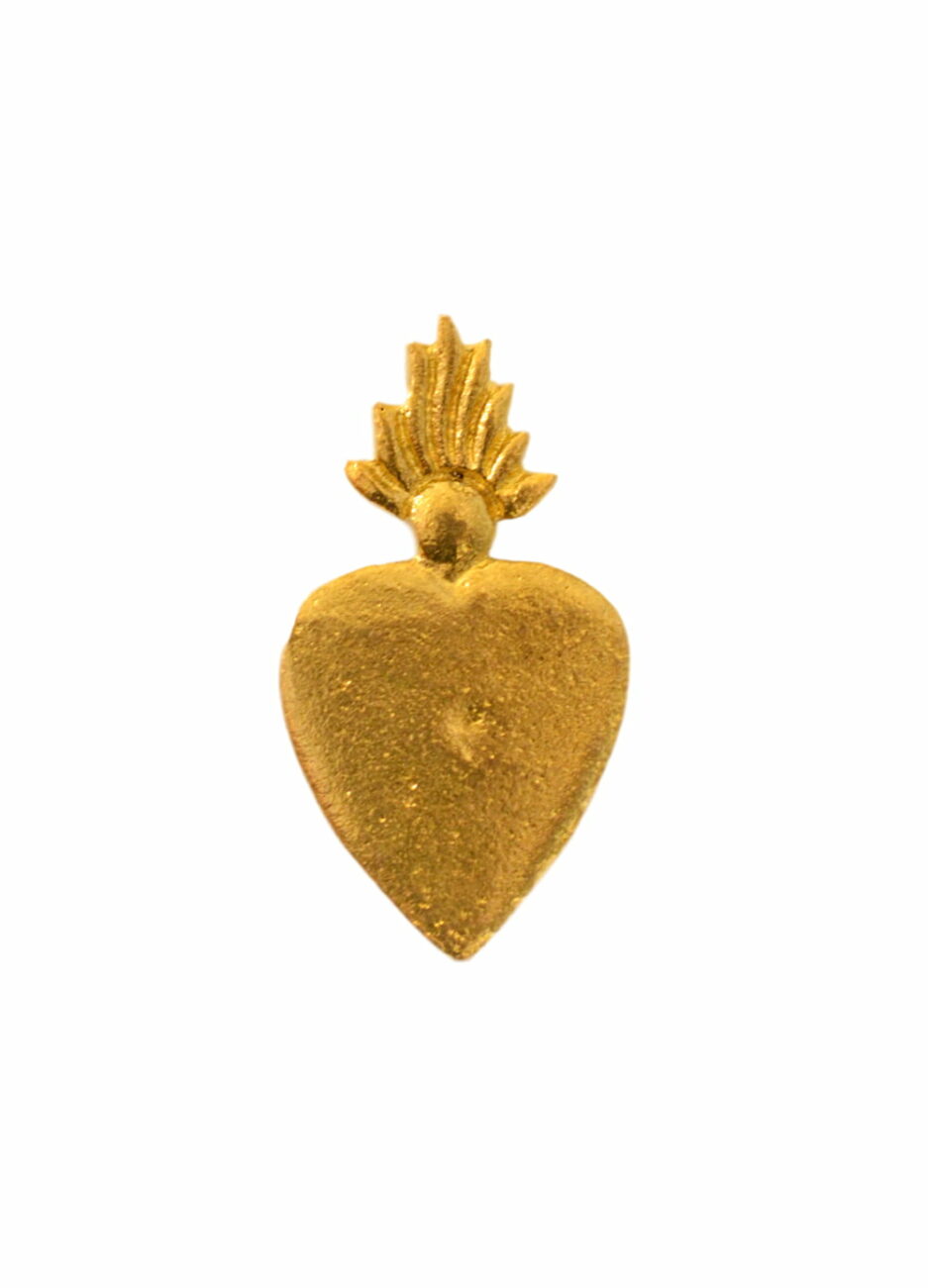 Clou doré en forme de coeur sacré